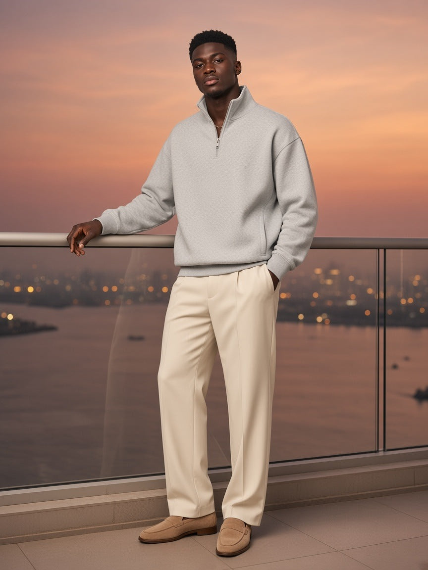 Two people à deux, the man wearing the Quarter-Zip Drop Shoulder Sweatshirt in Flower Gray
