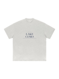 Lake Como Heavyweight Drop Shoulder T-Shirt by Marcel Afters in Oat Gray, front view with the printed artwork, on white