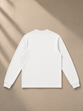 Non-shrink mock neck sweatshirt in White, laid flat on pale limestone, back view
