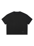 Unisex boxy Coolmax t-shirt in Black, front view on white. Marcel Afters