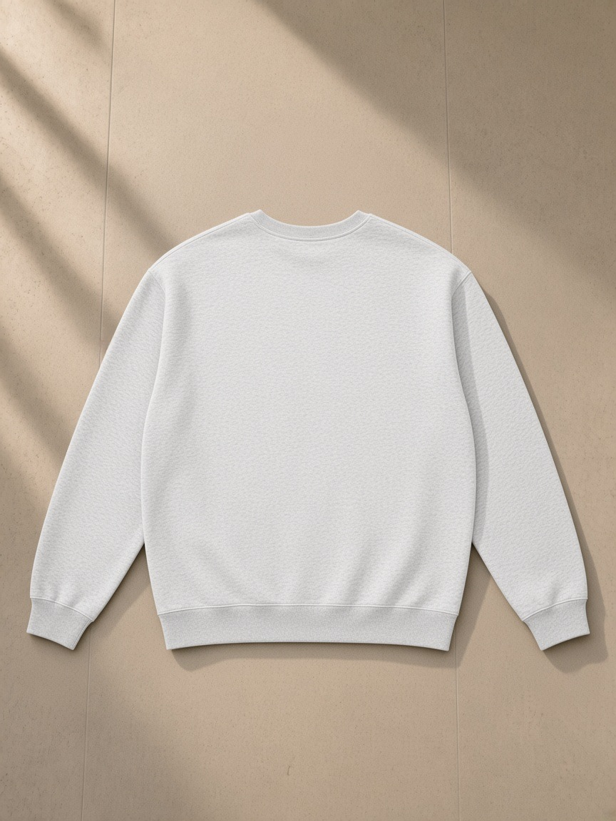 Loose Crewneck Sweatshirt in Flower Gray, laid flat on pale limestone, back view
