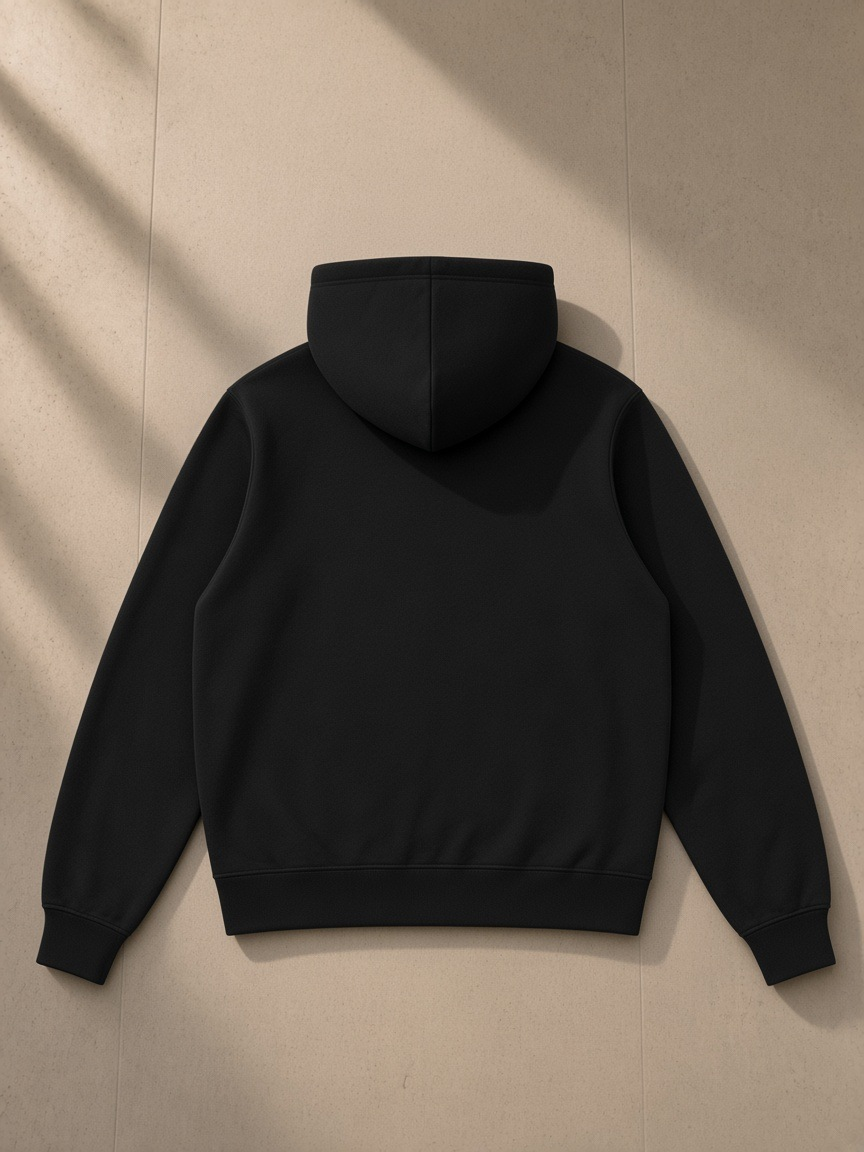 Fleece Full Zip Hoodie in Black, laid flat on pale limestone, back view