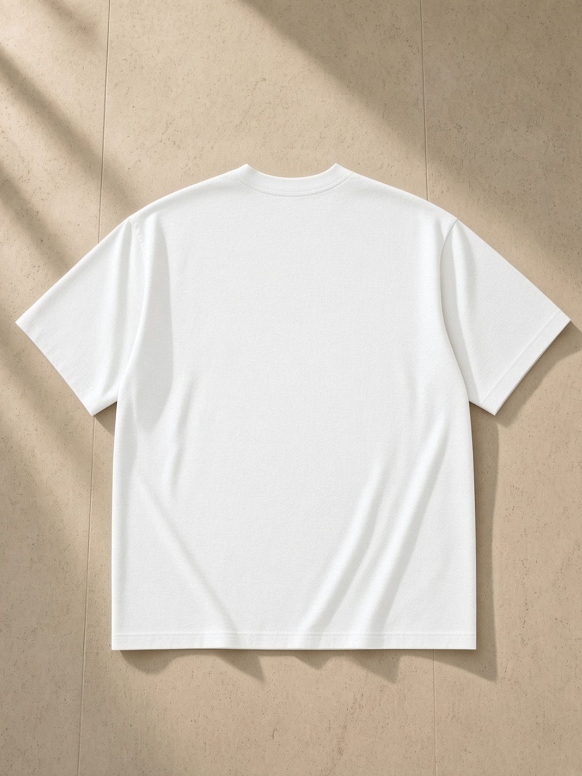 Paris heavyweight drop-shoulder tee in White, back view, plain back