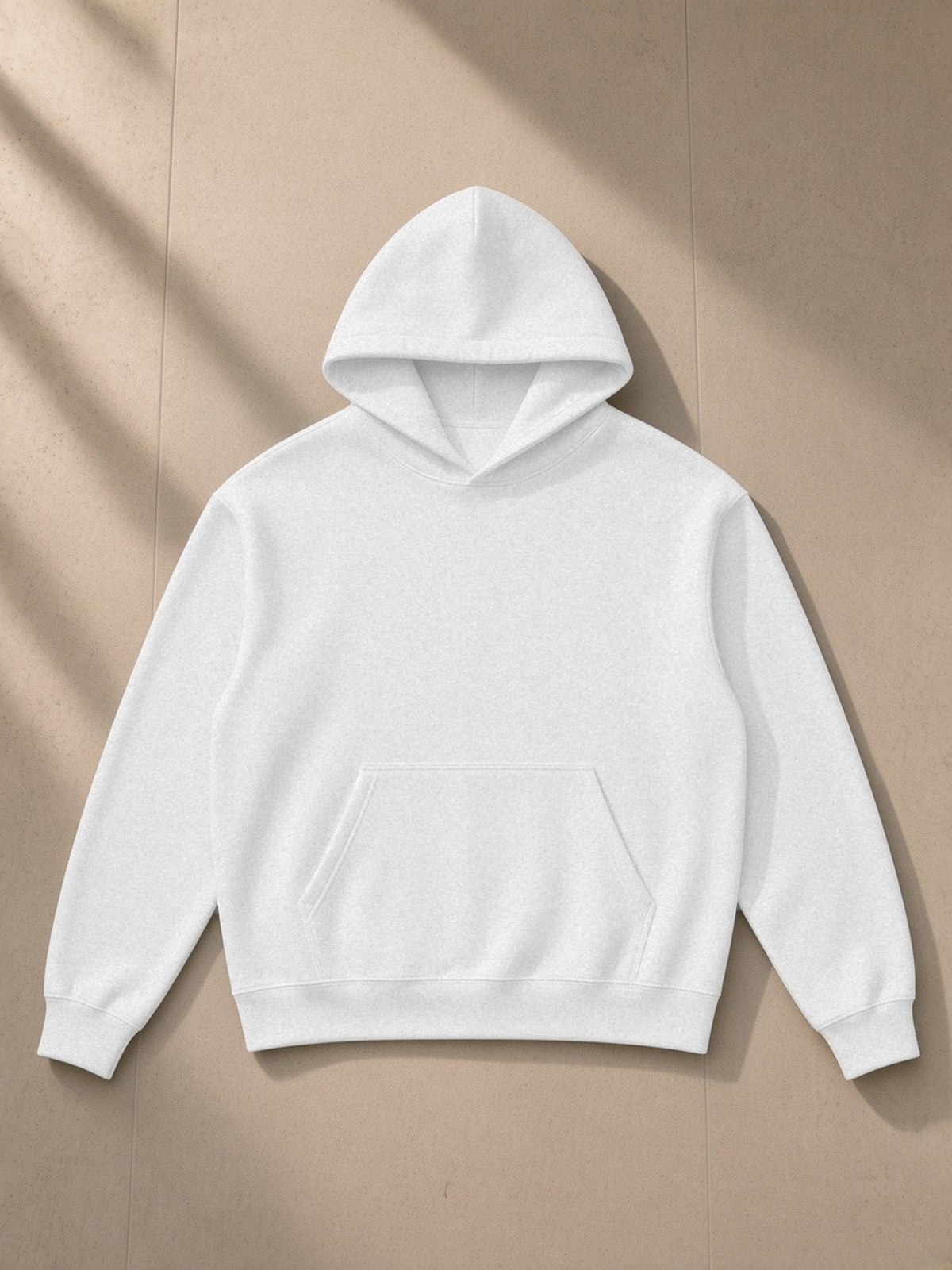 Essential Heavyweight Drop-Shoulder Hoodie in Flower Gray, laid flat on pale limestone, front.