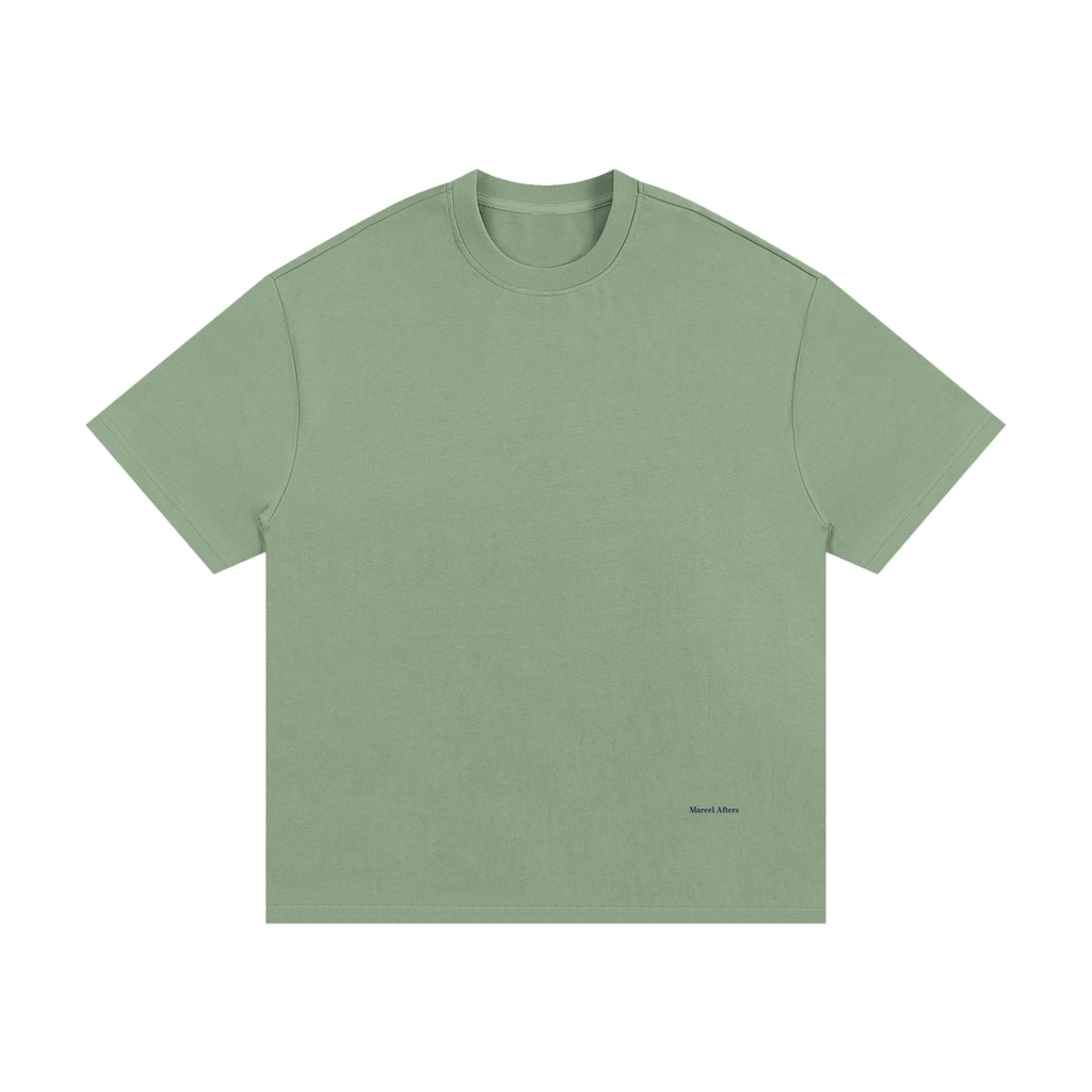 Essential Heavyweight Cotton T-Shirt in Light Green, front view, small Marcel Afters wordmark at the lower left front.
