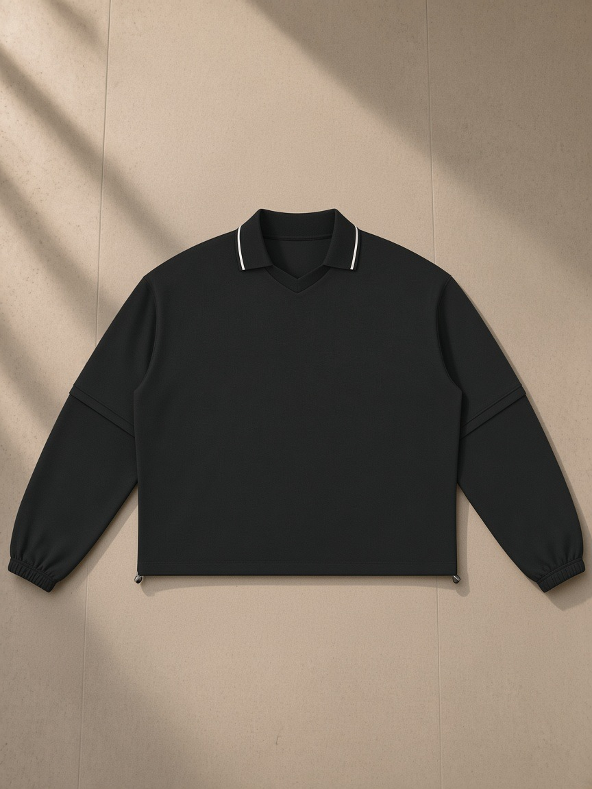 Boxy Detachable Collar Sweatshirt in Black, laid flat on pale limestone