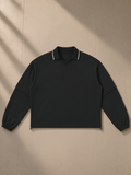 Boxy Detachable Collar Sweatshirt in Black, laid flat on pale limestone