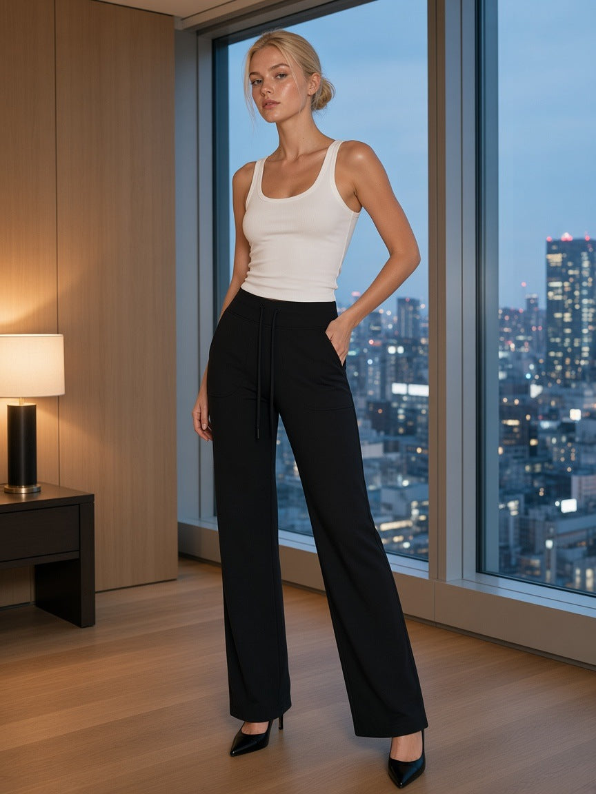 Women’s High Rise Straight Leg Yoga Pants in Black, front view.