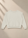 Raw Edge Crewneck Sweatshirt in Khaki Green, laid flat on pale limestone, front.