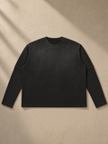 Vintage Wash Layered T-Shirt in Black, laid flat on pale limestone