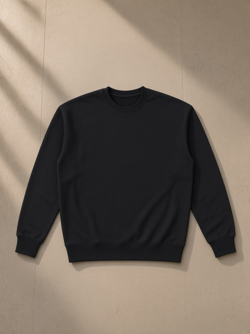 Unisex heavyweight cotton sweatshirt in Black, front view on white. Marcel Afters