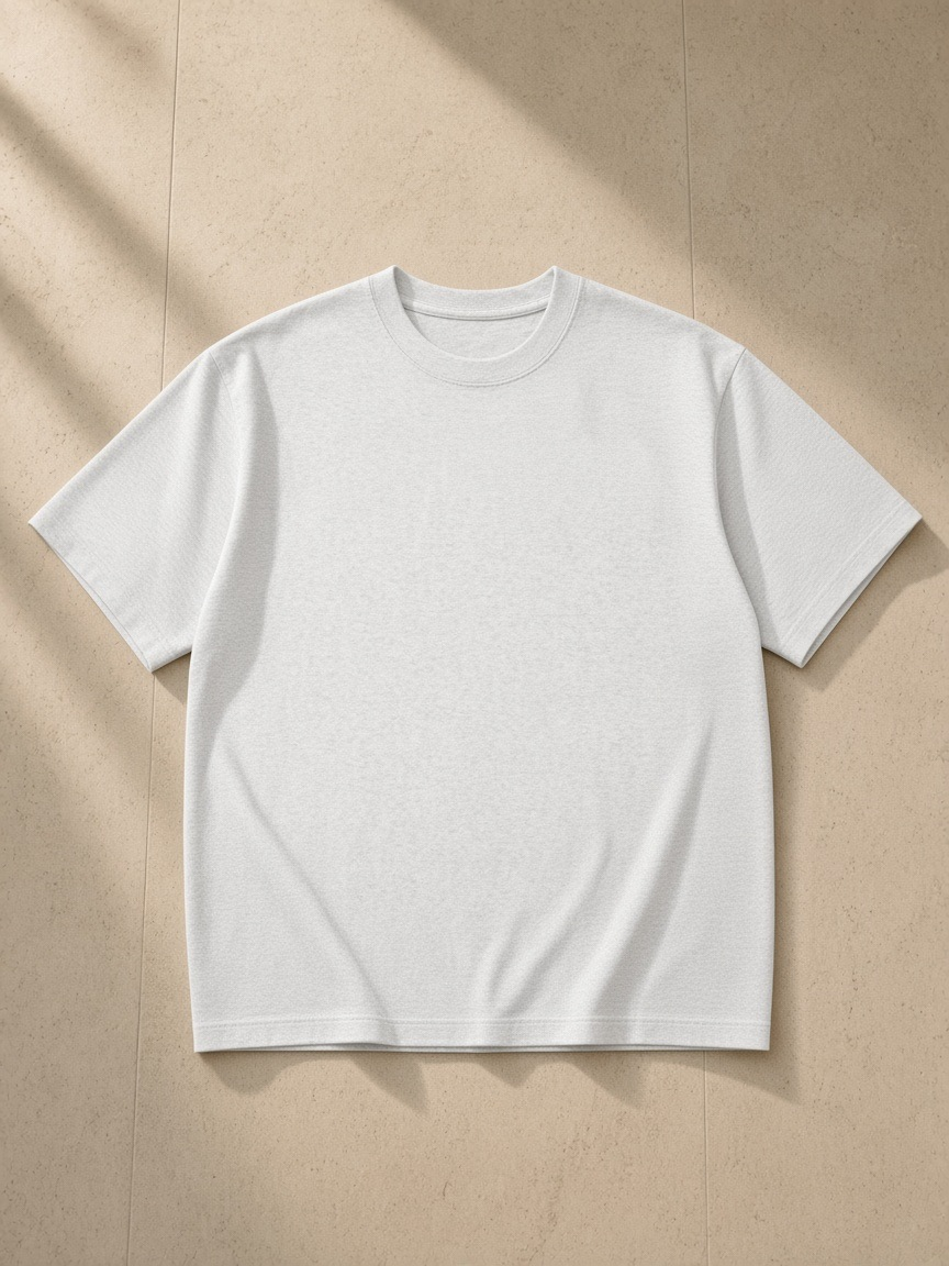 Unisex heavyweight drop shoulder cotton t-shirt in Light Gray, front view on white. Marcel Afters