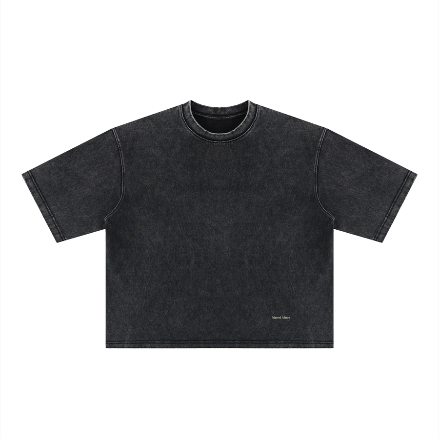 Men's Heavyweight Mineral Wash Boxy T-Shirt in Black, front view, small Marcel Afters wordmark at the lower left front.