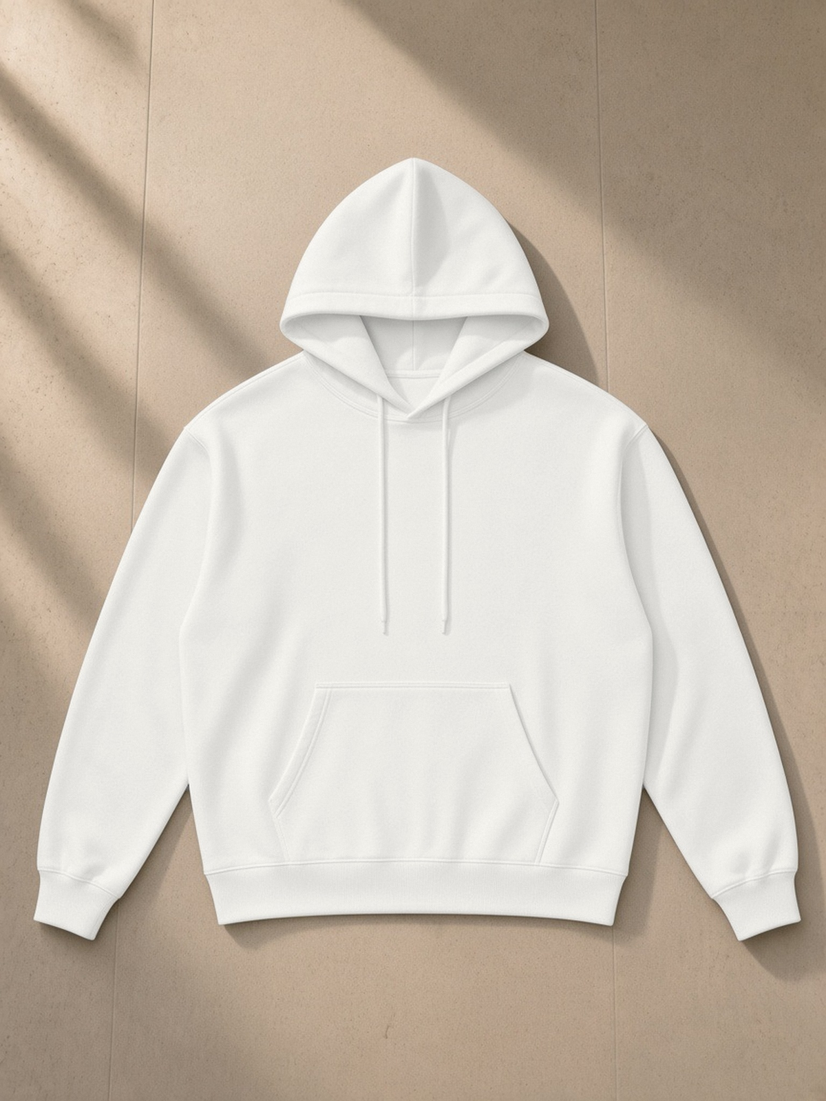 Relaxed Fit Hoodie in Oat Gray, laid flat on pale limestone, front.