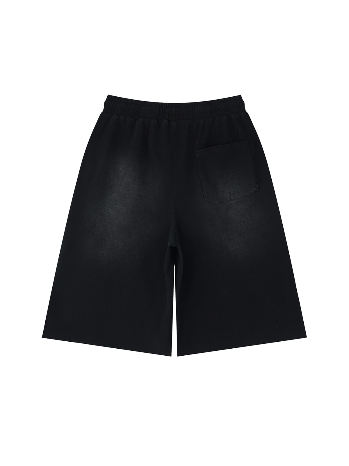 Unisex sunfade raw edge shorts in Black, back view on white. Marcel Afters