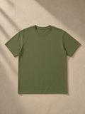 Pure Cotton T-Shirt in Army Green, laid flat on pale limestone