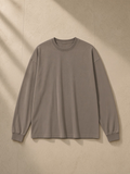 Vintage Washed Long Sleeve T-Shirt in Brown, laid flat on pale limestone