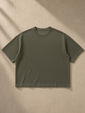 Unisex vintage wash sunfade boxy waffle t-shirt in Army Green, front view on white. Marcel Afters