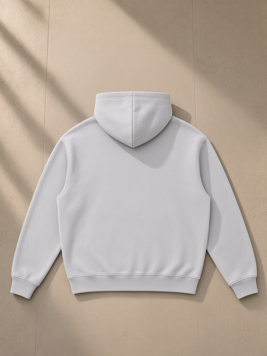 Snow Wash Fleece Oversize Hoodie in Light Gray, laid flat on pale limestone, back view