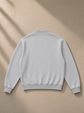 Unisex vintage wash fleece quarter zip sweatshirt in Flower Gray, laid flat on pale limestone