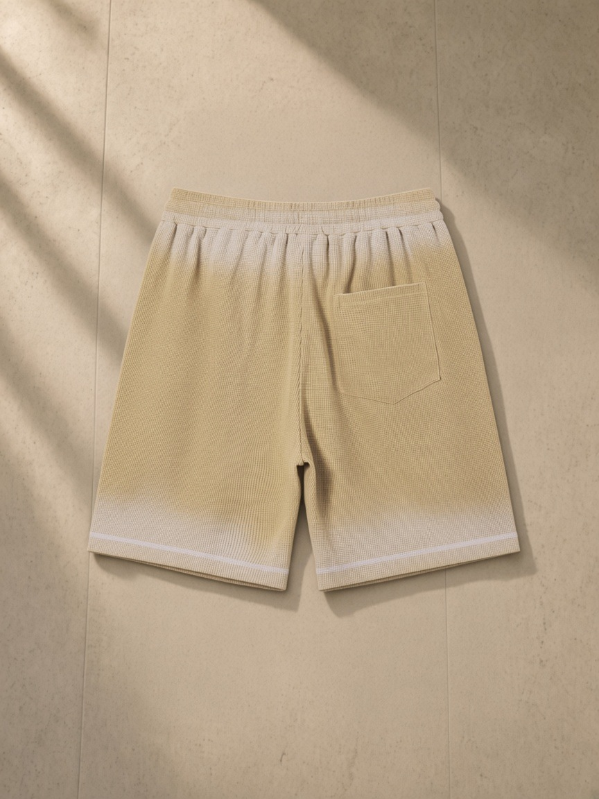 Sunfade Waffle Raw Hem Shorts in Khaki, laid flat on pale limestone, back.