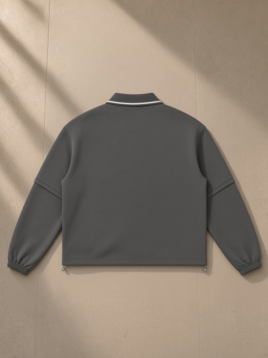 Boxy Detachable Collar Sweatshirt in Dark Gray, laid flat on pale limestone, back view