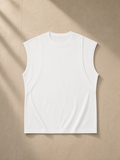 Unisex spliced panel sleeveless muscle t-shirt in White, laid flat on pale limestone