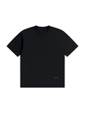 Unisex seamless cotton t-shirt in Black, front view on white. Marcel Afters