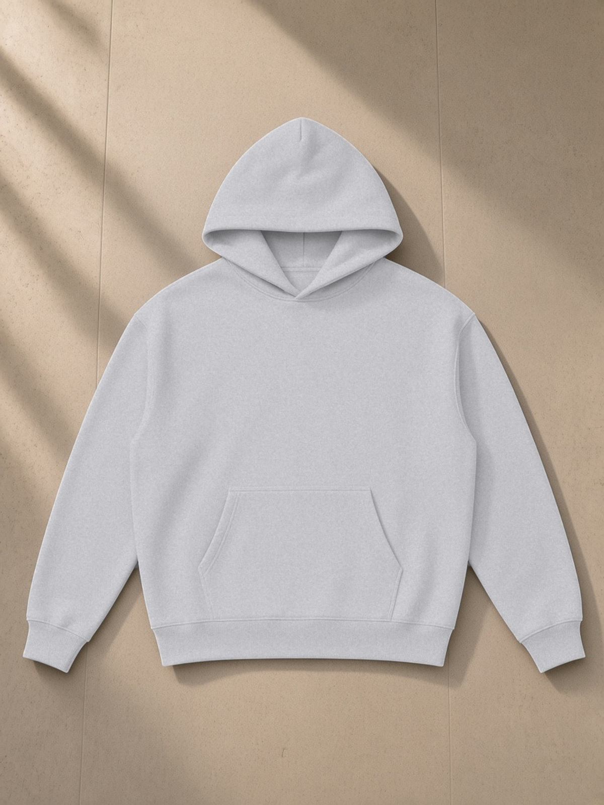 Essential Heavyweight Hoodie in Flower Gray, laid flat on pale limestone, front.