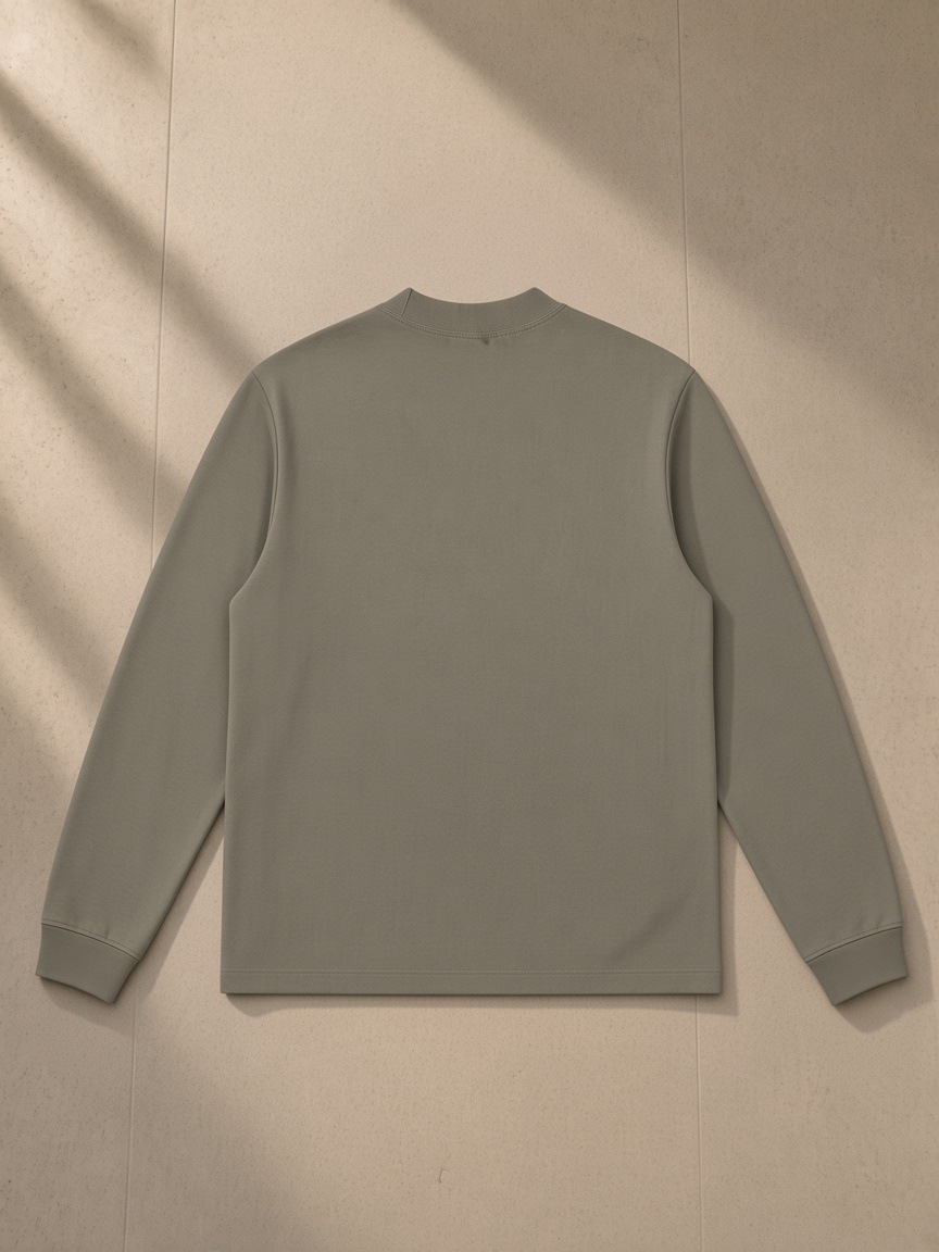 Mock Neck Sweatshirt in Gray, laid flat on pale limestone, back view