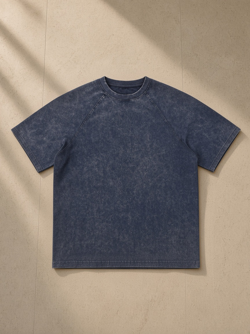 Unisex mineral wash raw edge t-shirt in Navy Blue, front view on white. Marcel Afters
