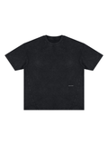 Unisex vintage wash paneling t-shirt in Black, front view on white. Marcel Afters