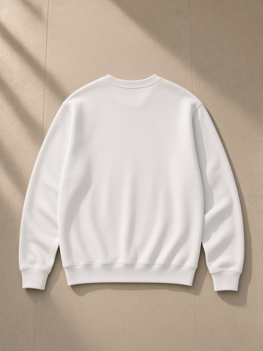Classic Cotton Sweatshirt in Lucent White, laid flat on pale limestone, back view
