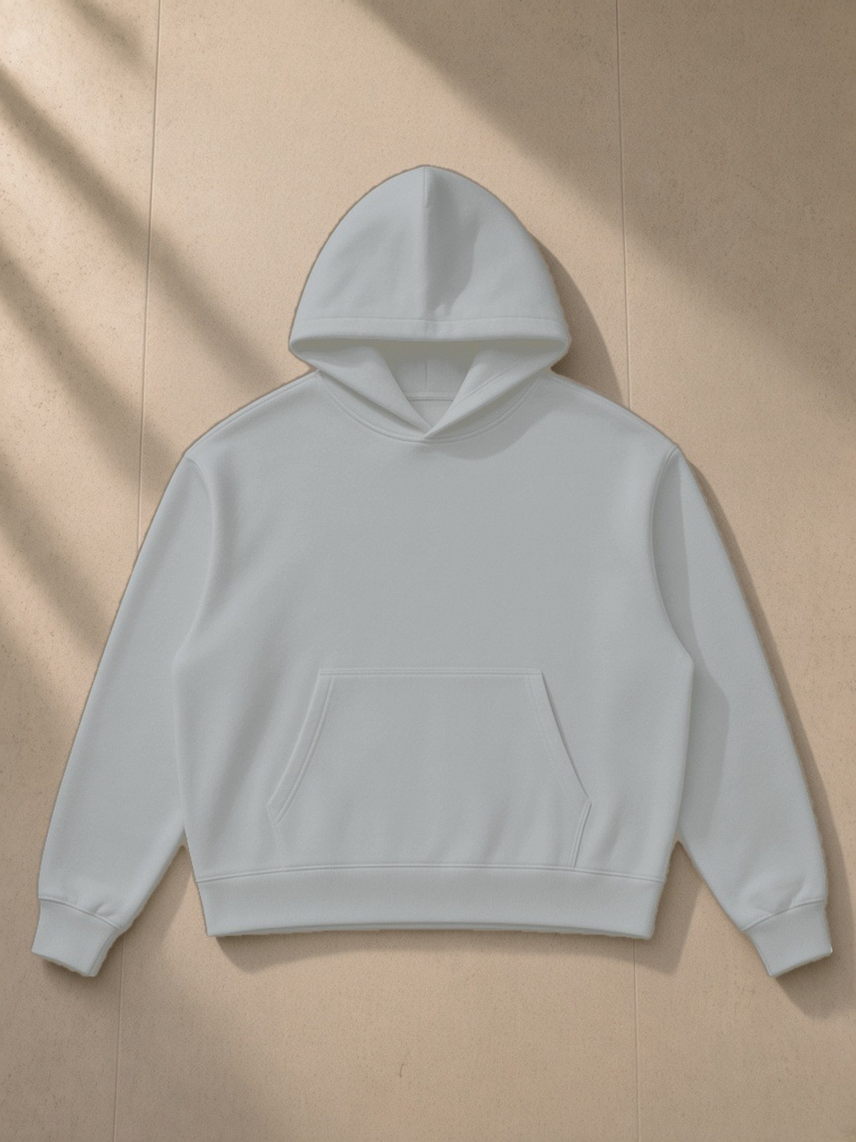 Drop Shoulder Hoodie in Flower Gray, laid flat on pale limestone, front view