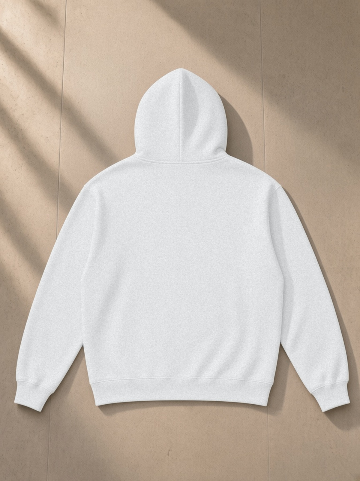 Relaxed Fit Hoodie in Flower Gray, laid flat on pale limestone, back.