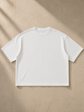 Unisex washed rolled hem half sleeve t-shirt in White, front view on white. Marcel Afters