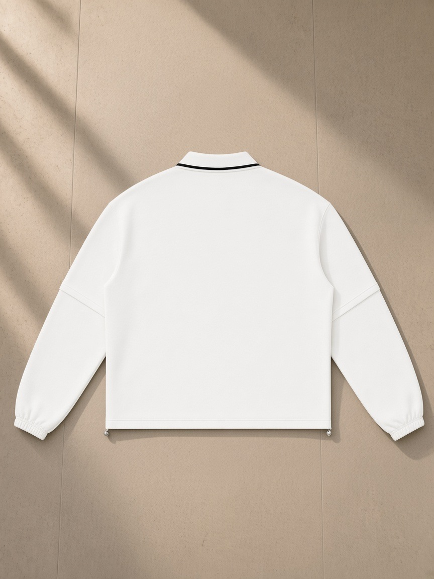 Boxy Detachable Collar Sweatshirt in White, laid flat on pale limestone, back view
