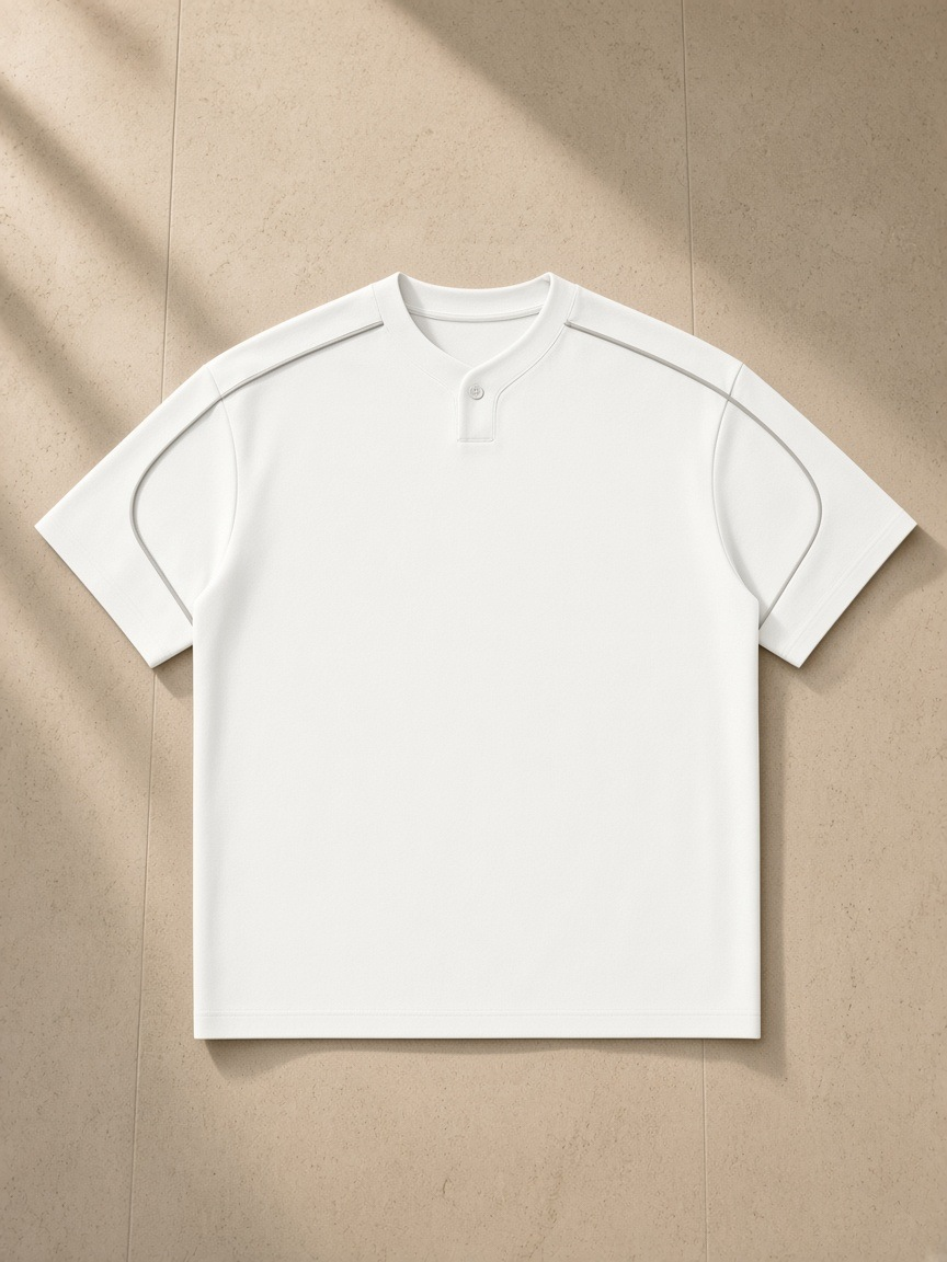 Oversized piping henley t-shirt in White, laid flat on pale limestone