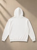 Unisex heavyweight hoodie in White, laid flat on pale limestone, back view