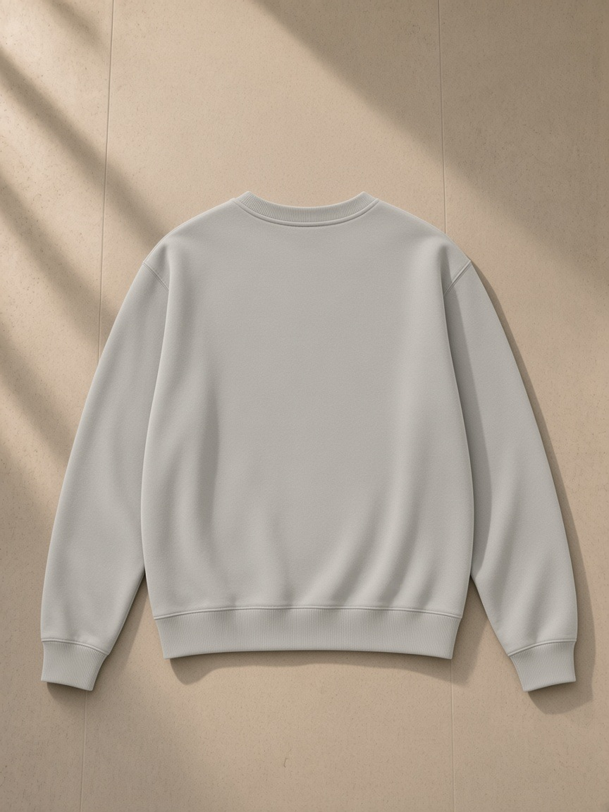 Classic Cotton Sweatshirt in Hemp Ash, laid flat on pale limestone, back view