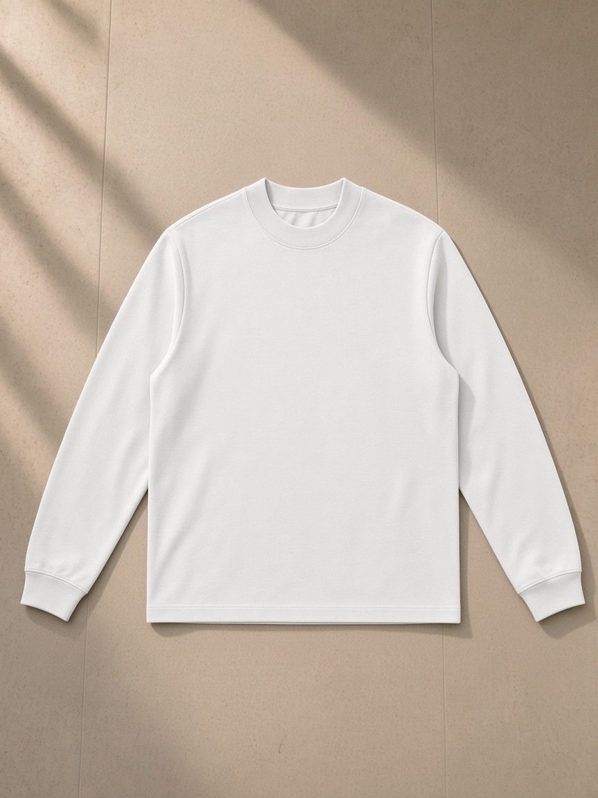 Mock Neck Sweatshirt in White, laid flat on pale limestone