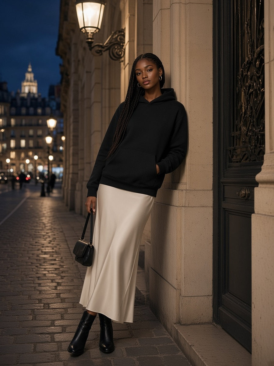 Woman in the Fleece Regular Shoulder Hoodie in Black, model front