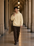 Man in the Oversize Fleeced Hoodie in Apricot, model front