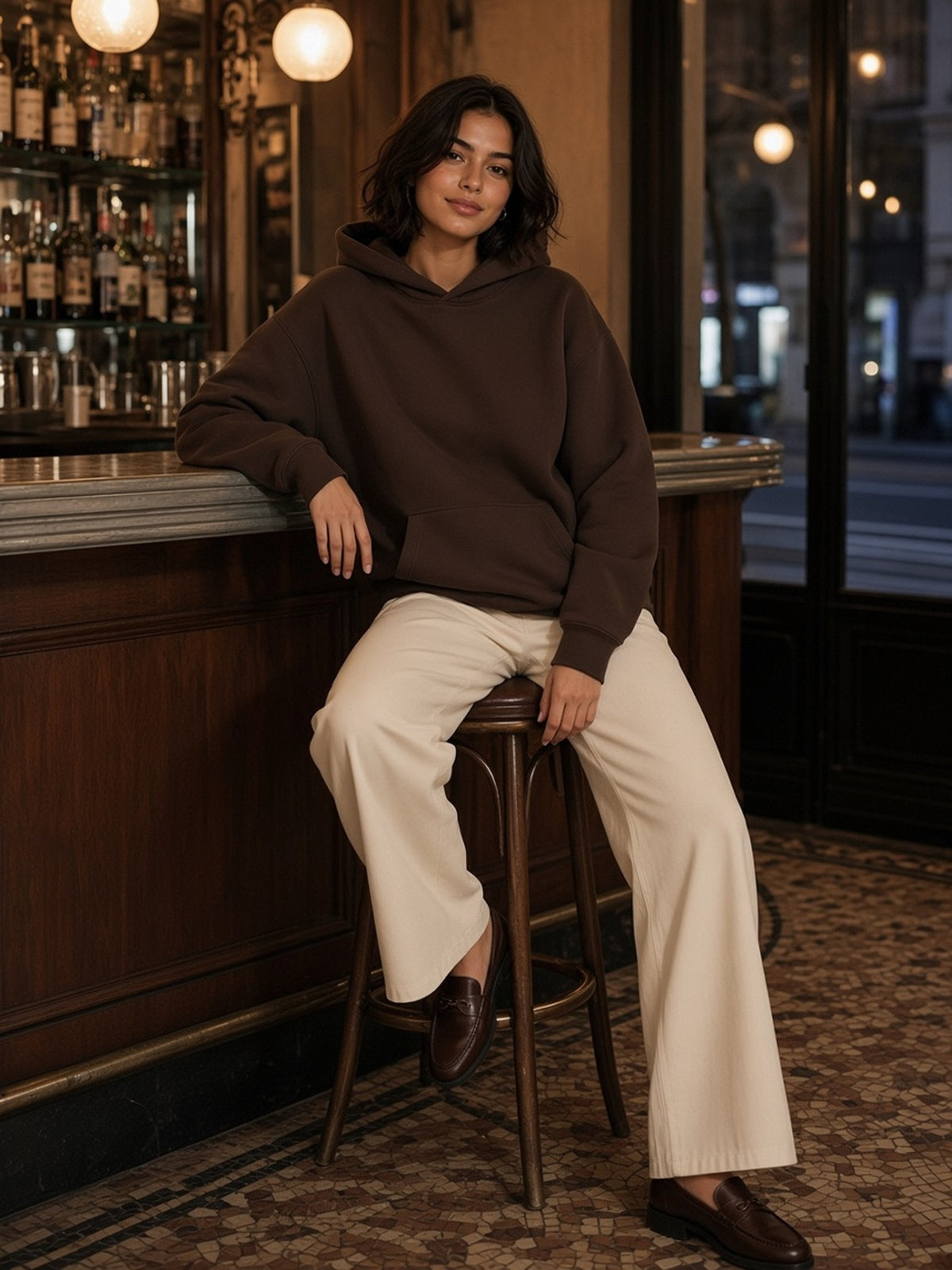 Woman in the Oversize Fleeced Hoodie in Coffee, model front