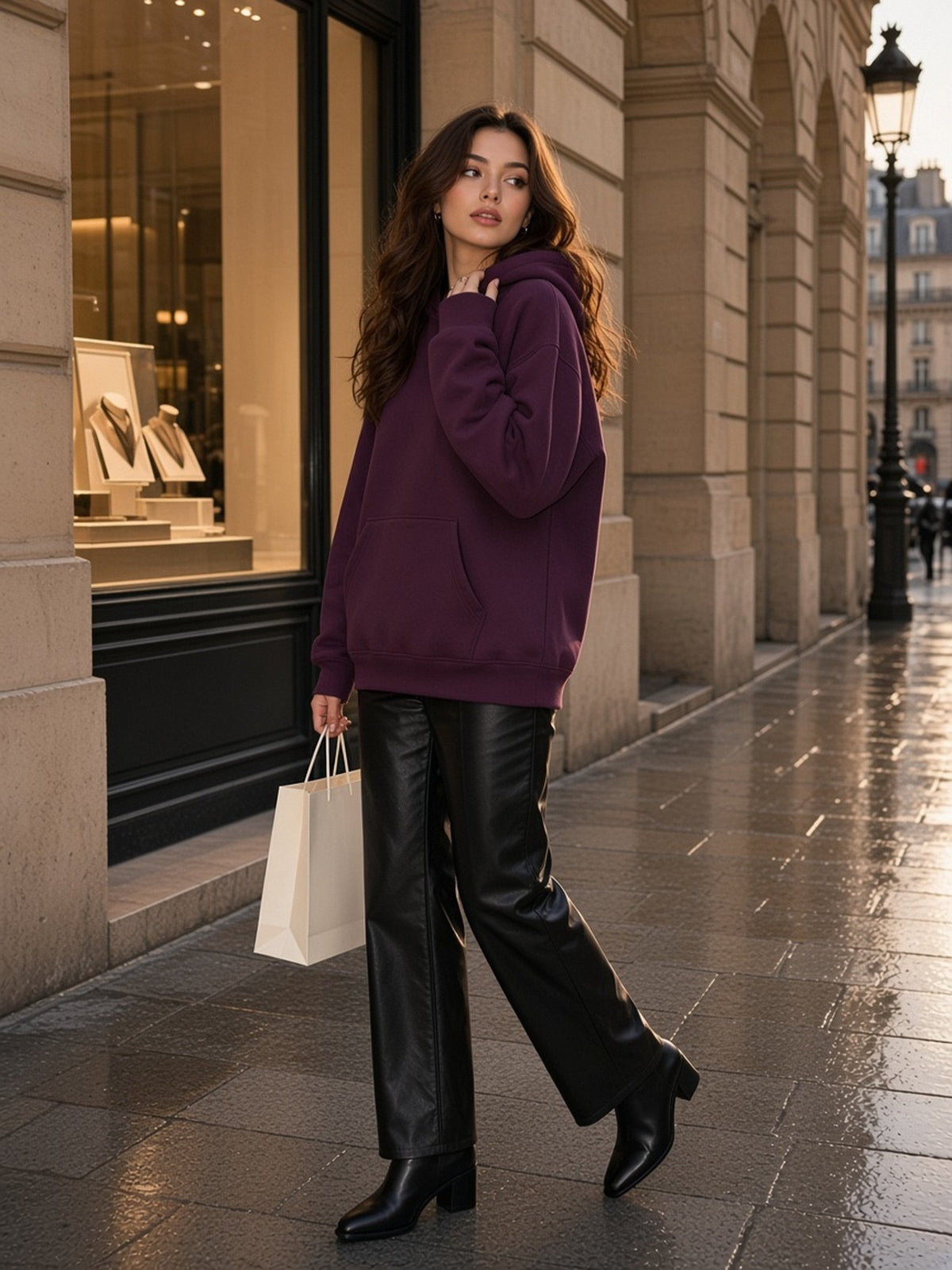 Woman in the Oversize Fleeced Hoodie in Plum Purple, model front