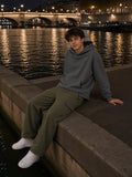 Man in the Vintage Wash Raw Edge Boxy Hoodie in Dark Gray, model front