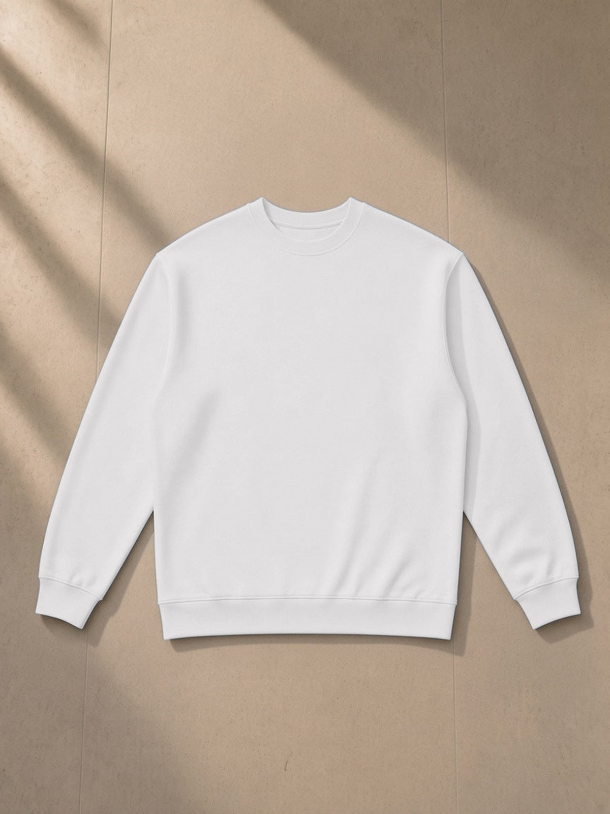 Oversized Crewneck Sweatshirt in Flower Gray, laid flat on pale limestone, front view