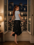 Woman in the Modal Bodycon Henley Shirt in Gray, model back