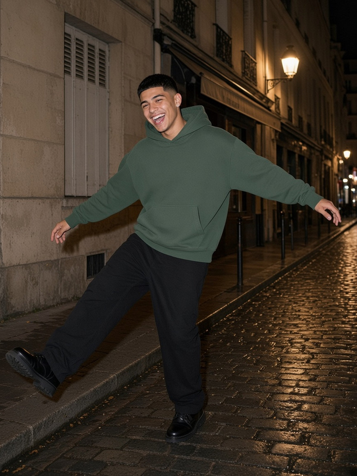 Man in the Heavyweight Vintage Wash Boxy Hoodie in Blackish Green, model front