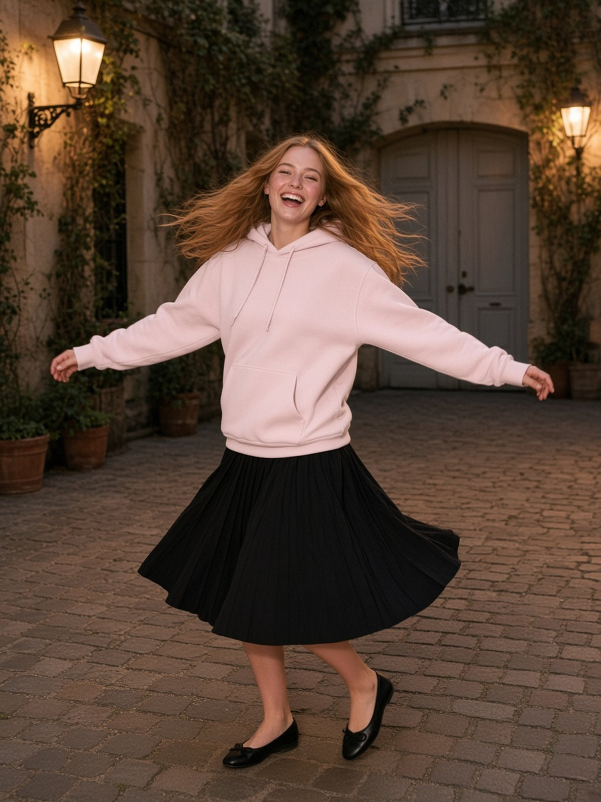 Woman in Marcel Afters Essential Heavyweight Hoodie in Pink, model front